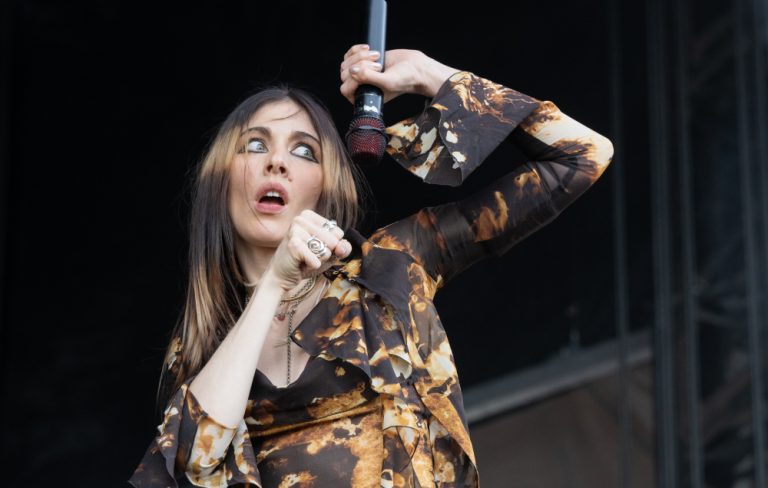 Watch Caroline Polachek sing Charli XCX and George Daniel down the aisle at their Sicilian wedding ceremony