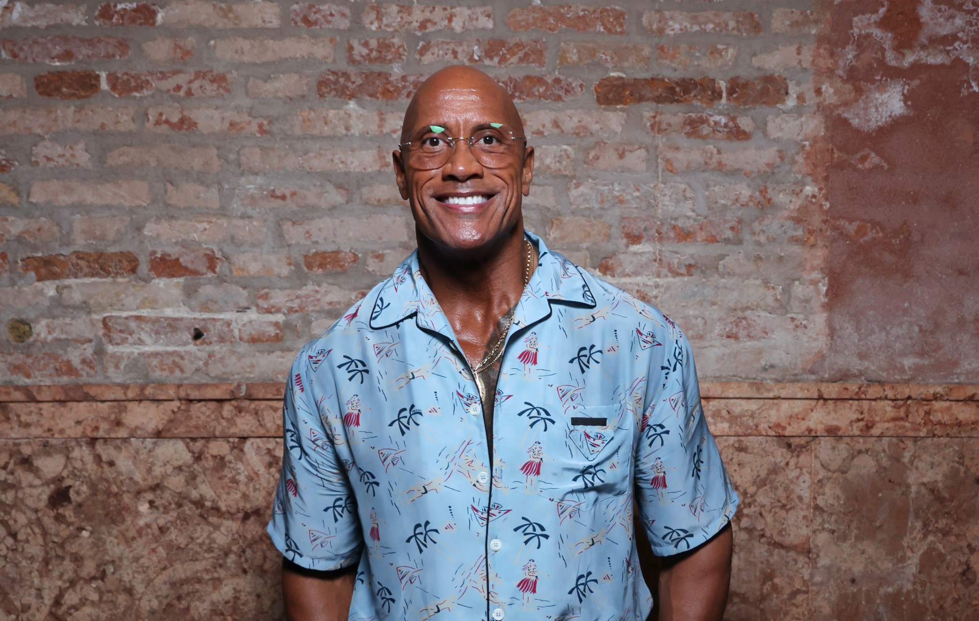 Dwayne Johnson says weight loss is for new role, playing a 70-year-old whose best friend is a chicken