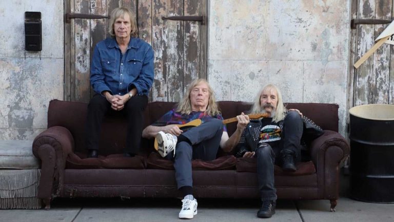 “It’s up to King Charles, it’s not up to us.” British rock legends Spinal Tap play down speculation over possible knighthoods, excite US talk show host with surprisingly meaty Big Bottom