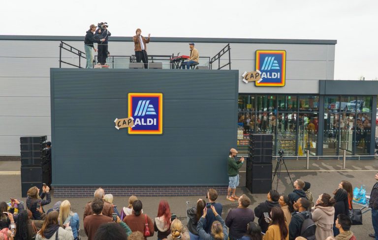 Lewis Capaldi surprises fans with performance of ‘Something In The Heavens’ on supermarket roof