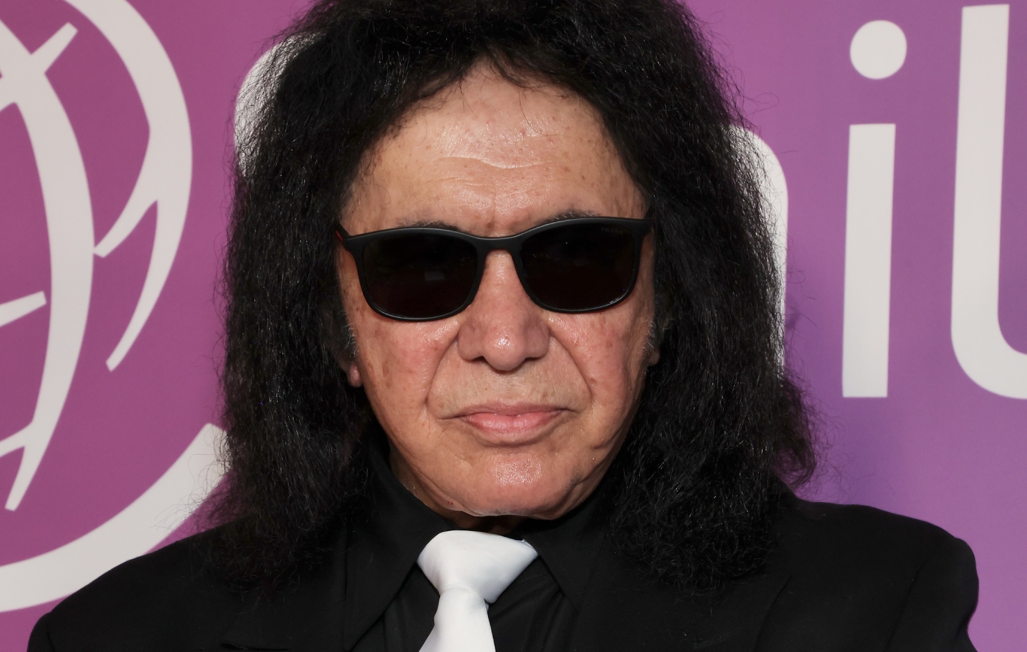 KISS’ Gene Simmons officiates wedding of Anthrax drummer Charlie Benante and singer Carla Harvey