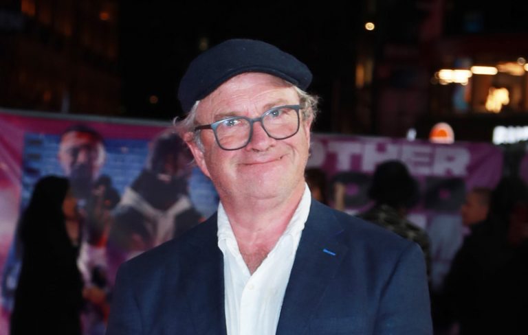 Harry Enfield defends Nelson Mandela Blackface sketch: “I wouldn’t do it now, but it’s a shame”
