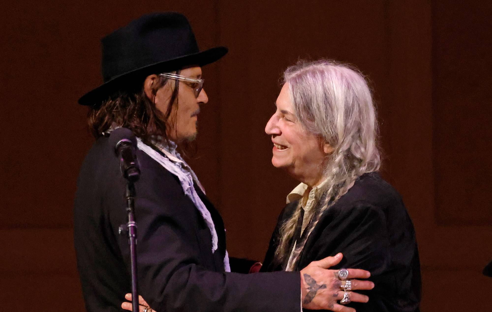 Patti Smith performs ‘People Have The Power’ with Johnny Depp at London ‘Horses’ show