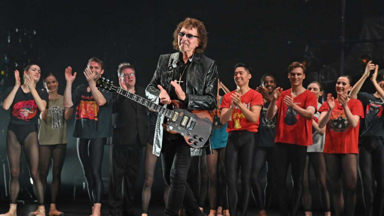 “Proud to call this infinitely modest and generous genius my friend”: Brian May shares video of surprise Tony Iommi appearance at Black Sabbath ballet