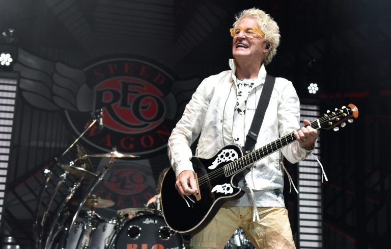 Watch classic REO Speedwagon line-up reunite to perform with University Of Illinois marching band