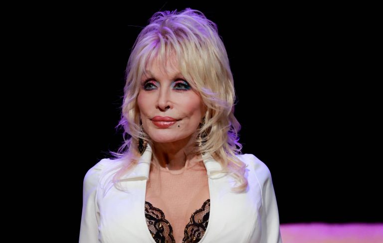 Dolly Parton reassures fans after health scare rumours: “I ain’t dead yet!”