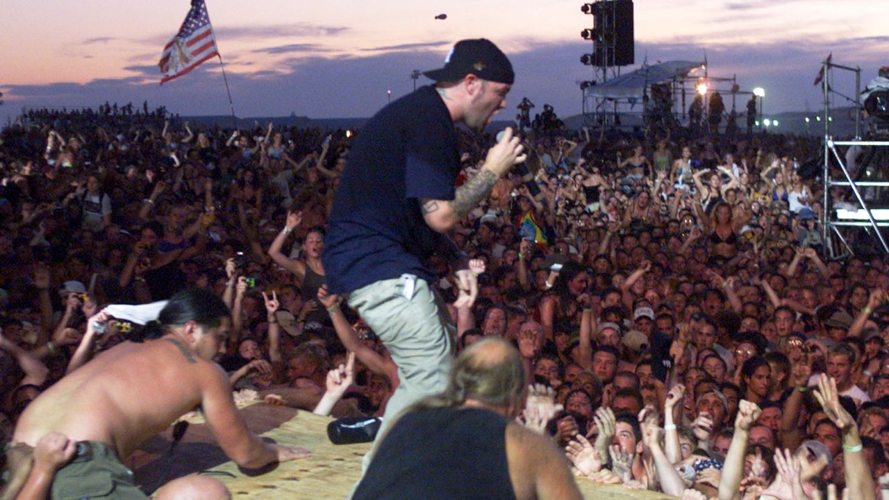 “That means start jumping and singing. It doesn’t mean start burning the place down. That’s not what I meant.” How a smash hit from some nu metal icons became intertwined with the most controversial music festival of the 90s