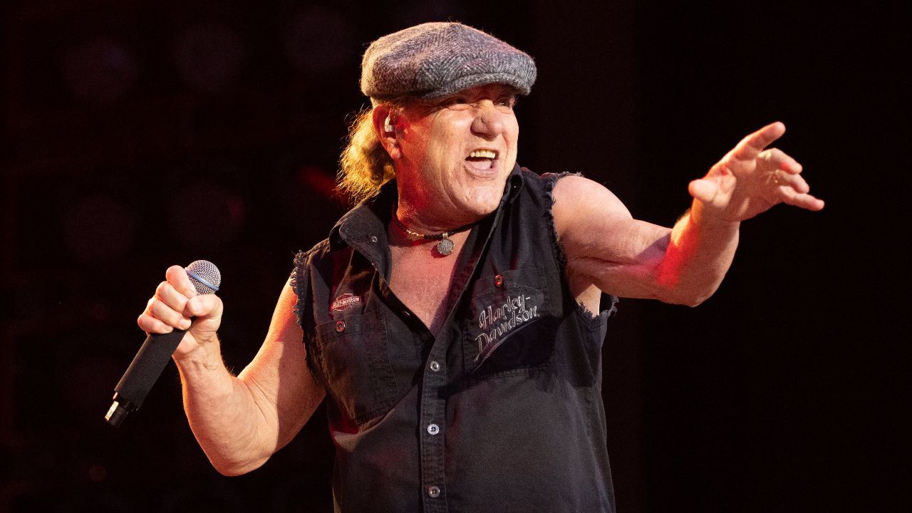 “I walked up behind him: ‘Hi Brian Johnson, I’m a guitar player. Do you want to go onstage and jam some songs?’ He went, ‘Yeah mate!'” How an AC/DC legend and a heavyweight guitarist covered Led Zeppelin at a famous baseball player’s wedding