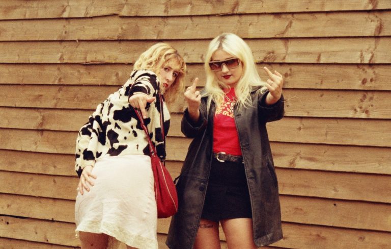 Lambrini Girls share new David Shrigley-designed limited edition cover art for ‘Who Let The Dogs Out’