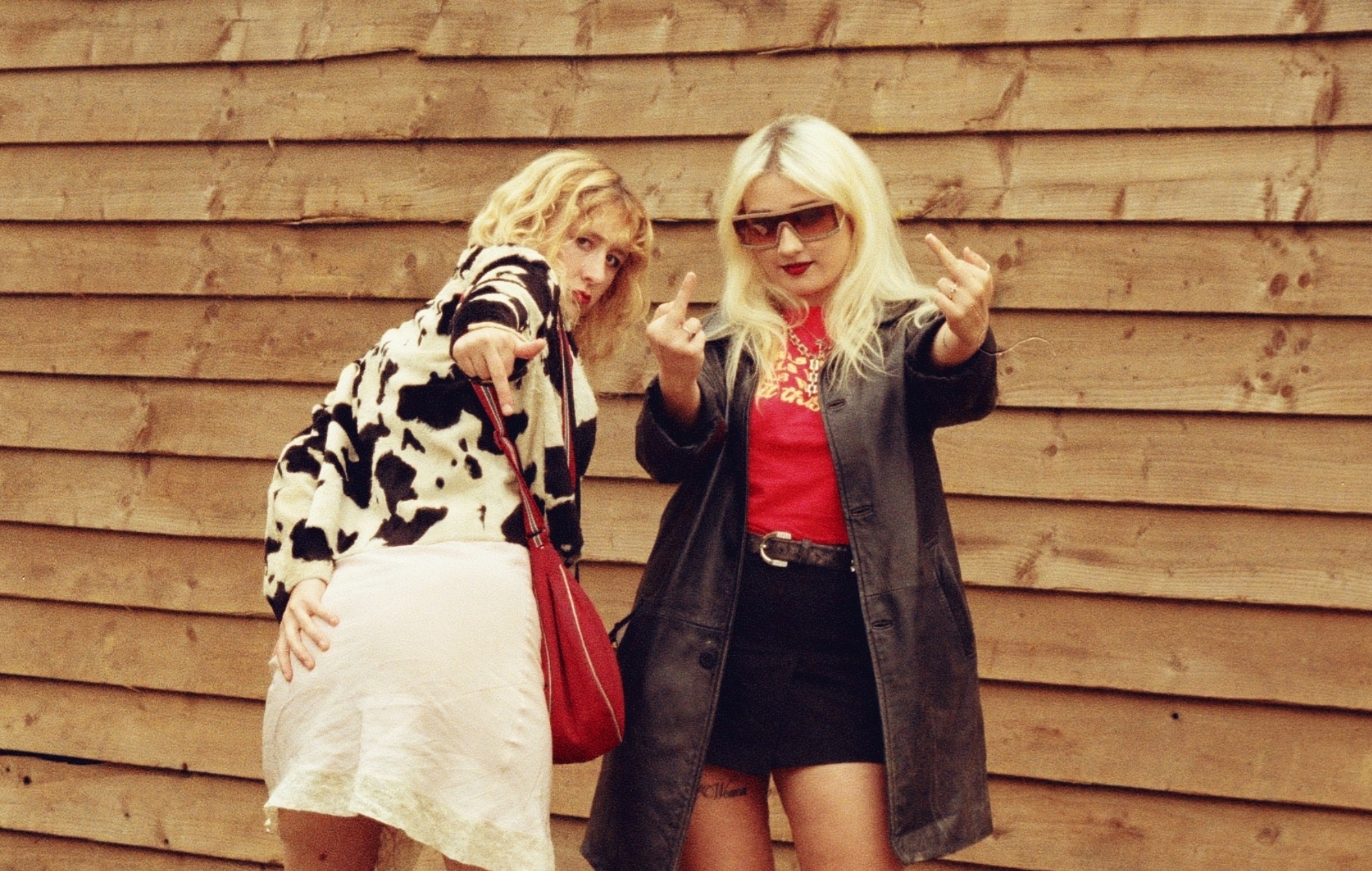 Lambrini Girls share new David Shrigley-designed limited edition cover art for ‘Who Let The Dogs Out’