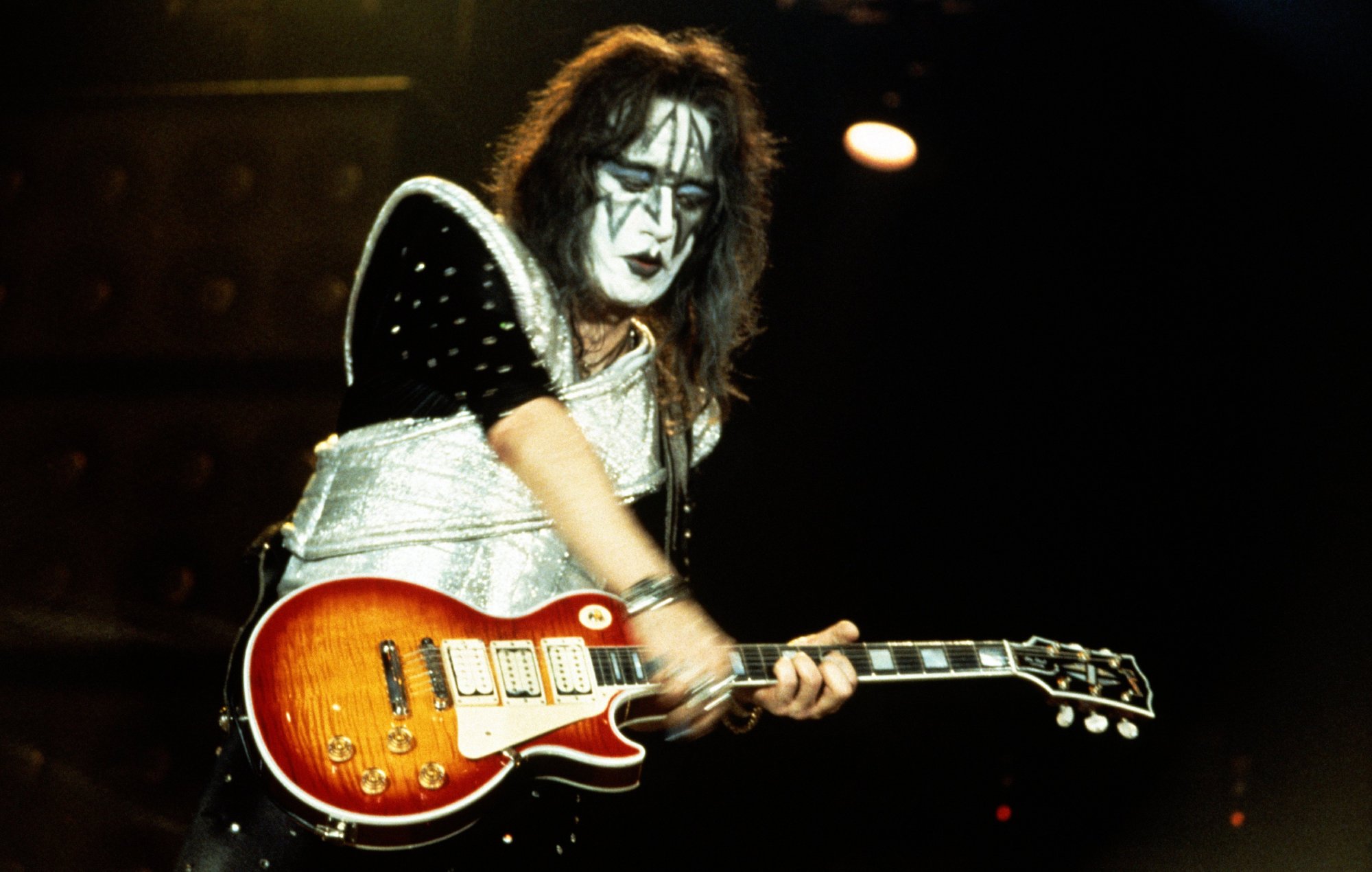 Watch KISS perform candlelit tribute to Ace Frehley at first “unmasked” show