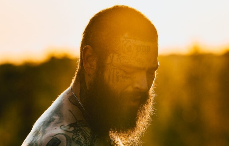 Watch Post Malone pay tribute to NFL star Marshawn Kneeland during Halftime Show performance