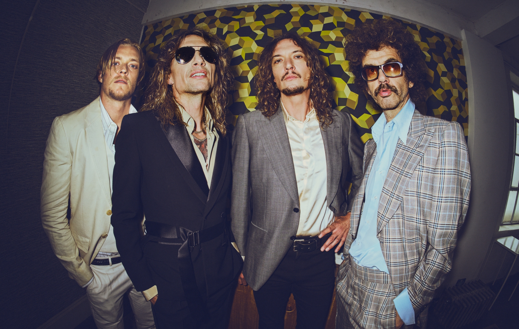 The Darkness “reimagine” Christmas classic ‘Mistletoe And Wine’ with “a few sprinkles of shoegaze and drone”