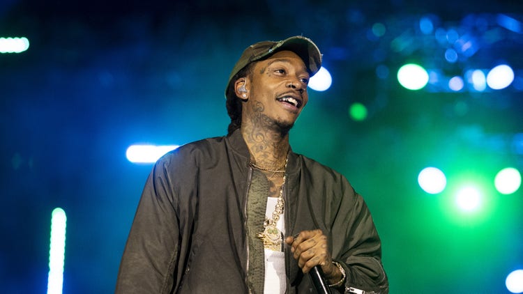 Wiz Khalifa Faces Up To Nine Months In Romanian Prison For Smoking Weed On Stage: What To Know
