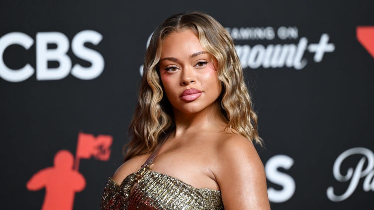 Latto Celebrates Her 27th Birthday With Cheeky Christmas-Themed Photos: “Merry Birthday To Me”