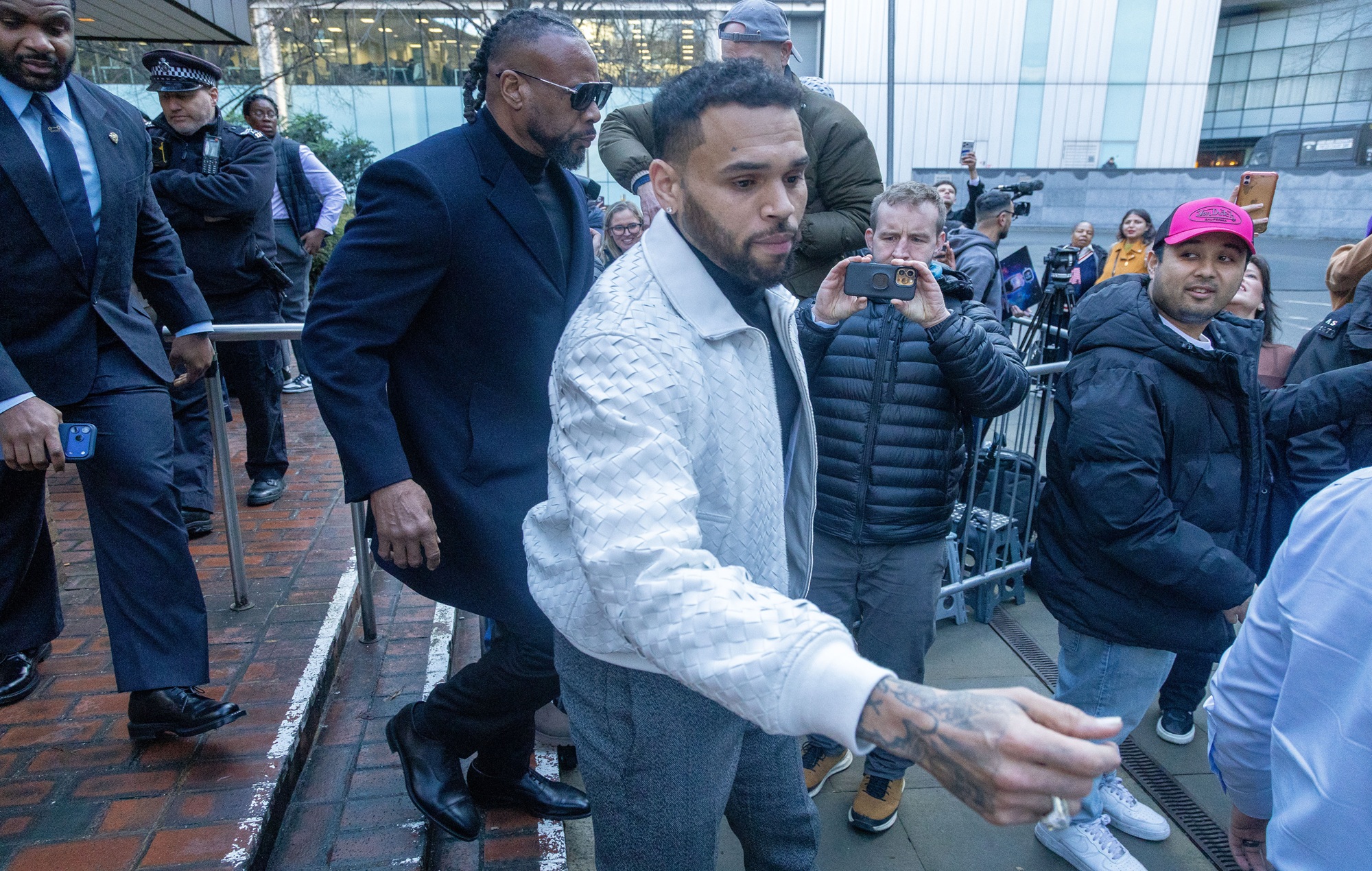 Chris Brown appears in London court over alleged bottle attack and Manchester arrest