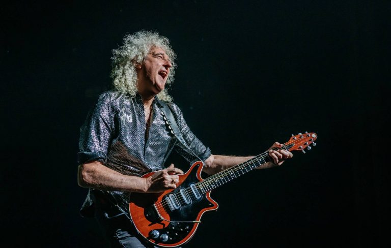 Brian May says Queen won’t be playing Glastonbury because of “politics”: “They like killing badgers”