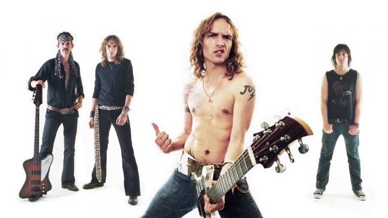 “I was naked in the vocal booth. At first, I did it as an experiment to see if it would help, then it became a tradition”: The story of the spandex-clad classic that launched its creators into the stratosphere