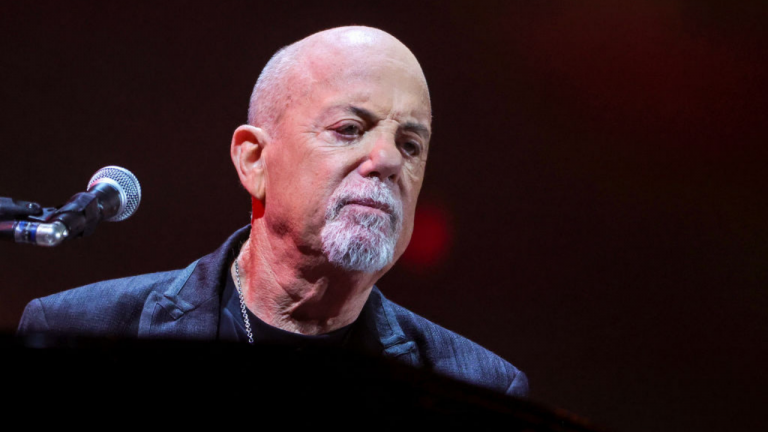 Watch Billy Joel perform live for first time since being diagnosed with rare brain condition – as he surprises tribute band and audience in Florida