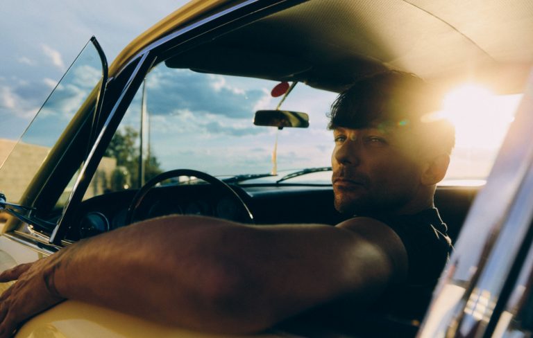 Louis Tomlinson talks finding his confidence: “I had to stare the things that I found intimidating in the face”