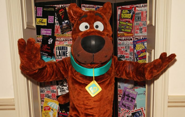 Band mortified after fan’s proposal gets rejected on stage – only for him to be comforted by Scooby Doo