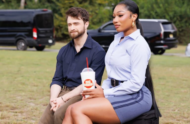 Megan Thee Stallion Flirts With Daniel Radcliffe In New Trailer For ‘The Fall and Rise of Reggie Dinkins’