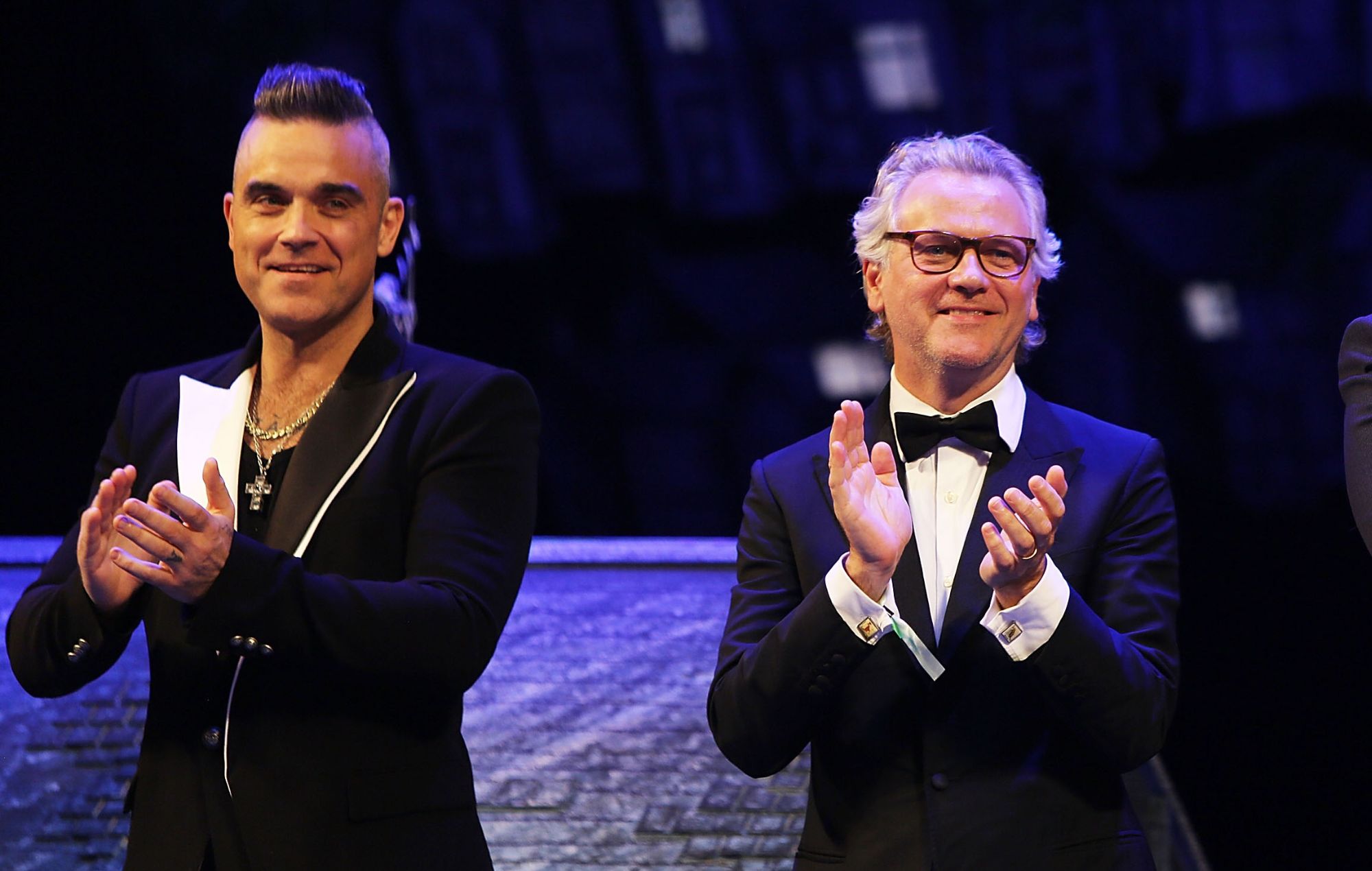 Watch Guy Chambers reunite with Robbie Williams on stage in Liverpool: “A very big, emotional night”
