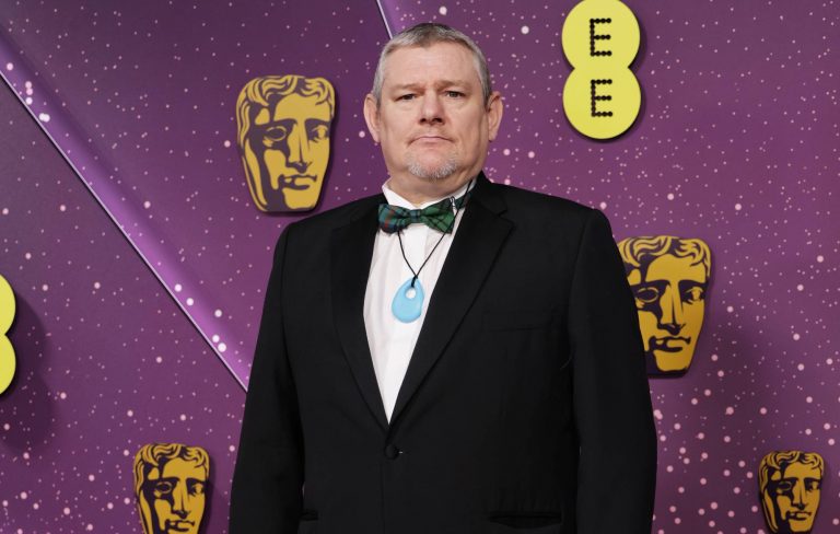‘I Swear’ subject John Davidson “deeply mortified” by Tourette’s N-word outburst at BAFTAs