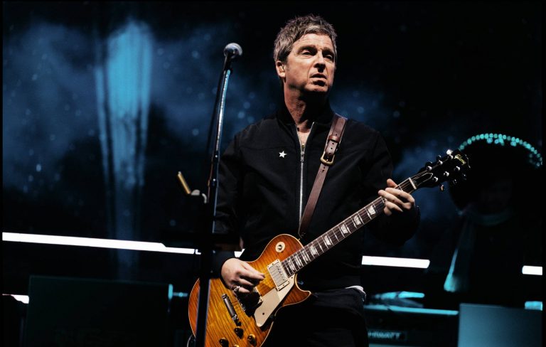 Noel Gallagher talks BRIT Awards Songwriter Of The Year controversy: “If anybody’s got a problem with it, meet me there. We’ll have it out on the red carpet”