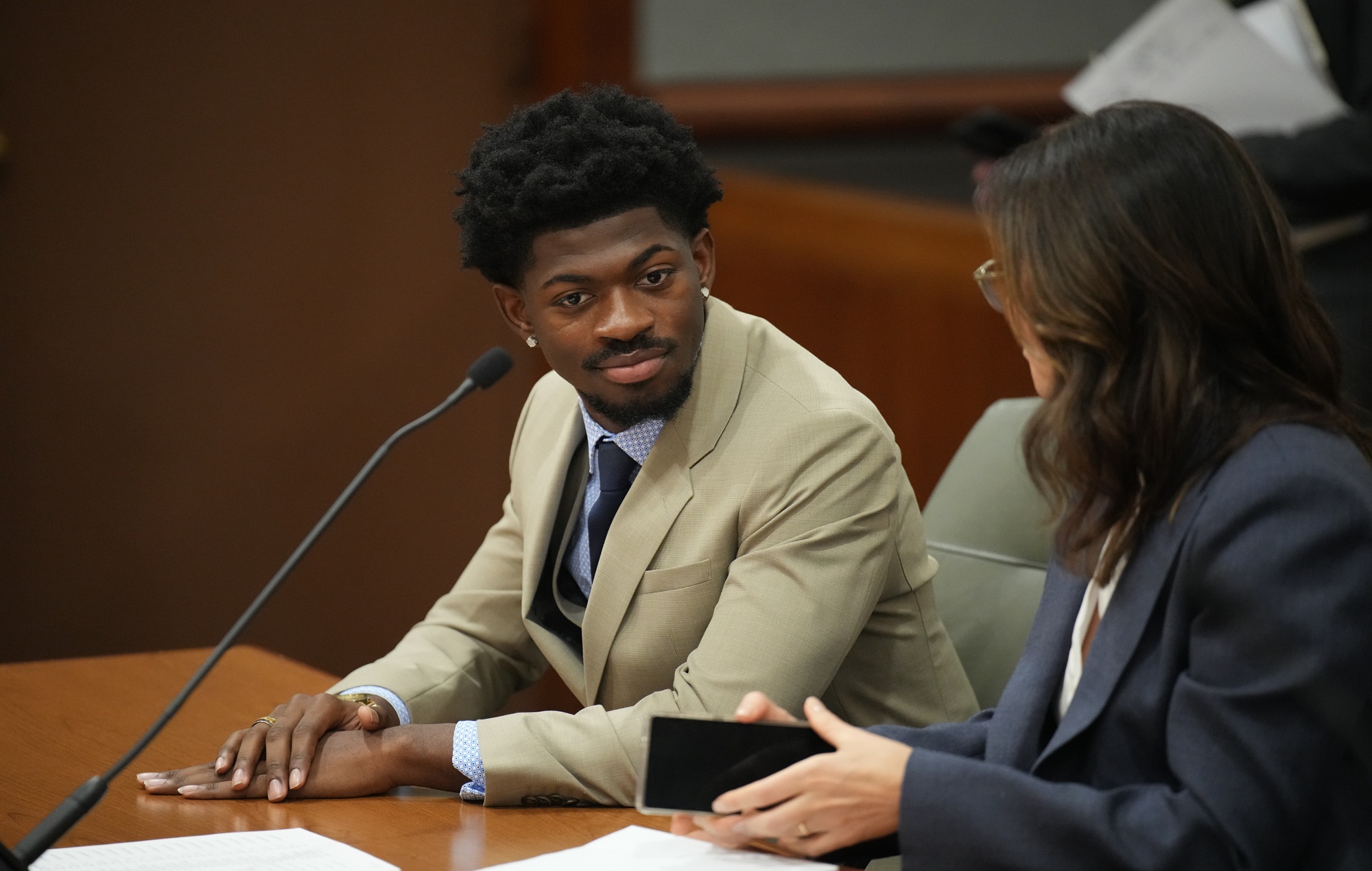 Lil Nas X issues statement after court appearance, tips Radiohead busker $100