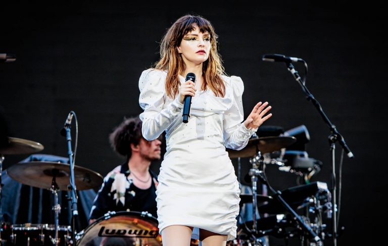 Watch Chvrches debut heavy new song ‘Conman’ at Robert Smith’s Teenage Cancer Trust shows at Royal Albert Hall