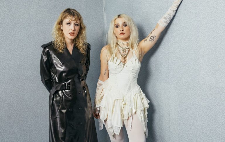 Lambrini Girls share timely single ‘Cult Of Celebrity’: “The elite are very much actually, the devil incarnate, baby eating, pedos”