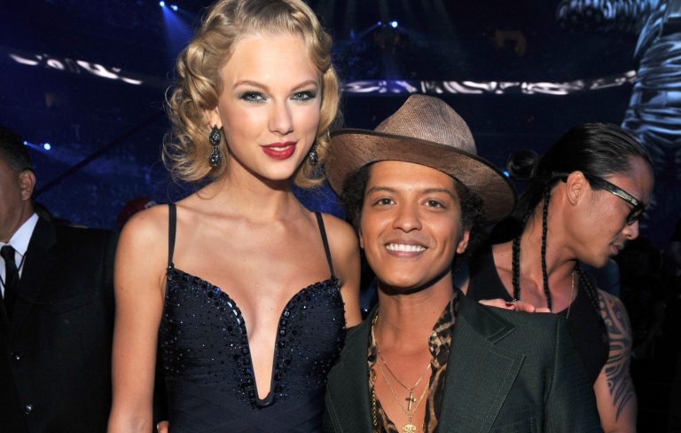 Bruno Mars responds after Taylor Swift fans accuse him of dissing her in liking post calling her “talentless”