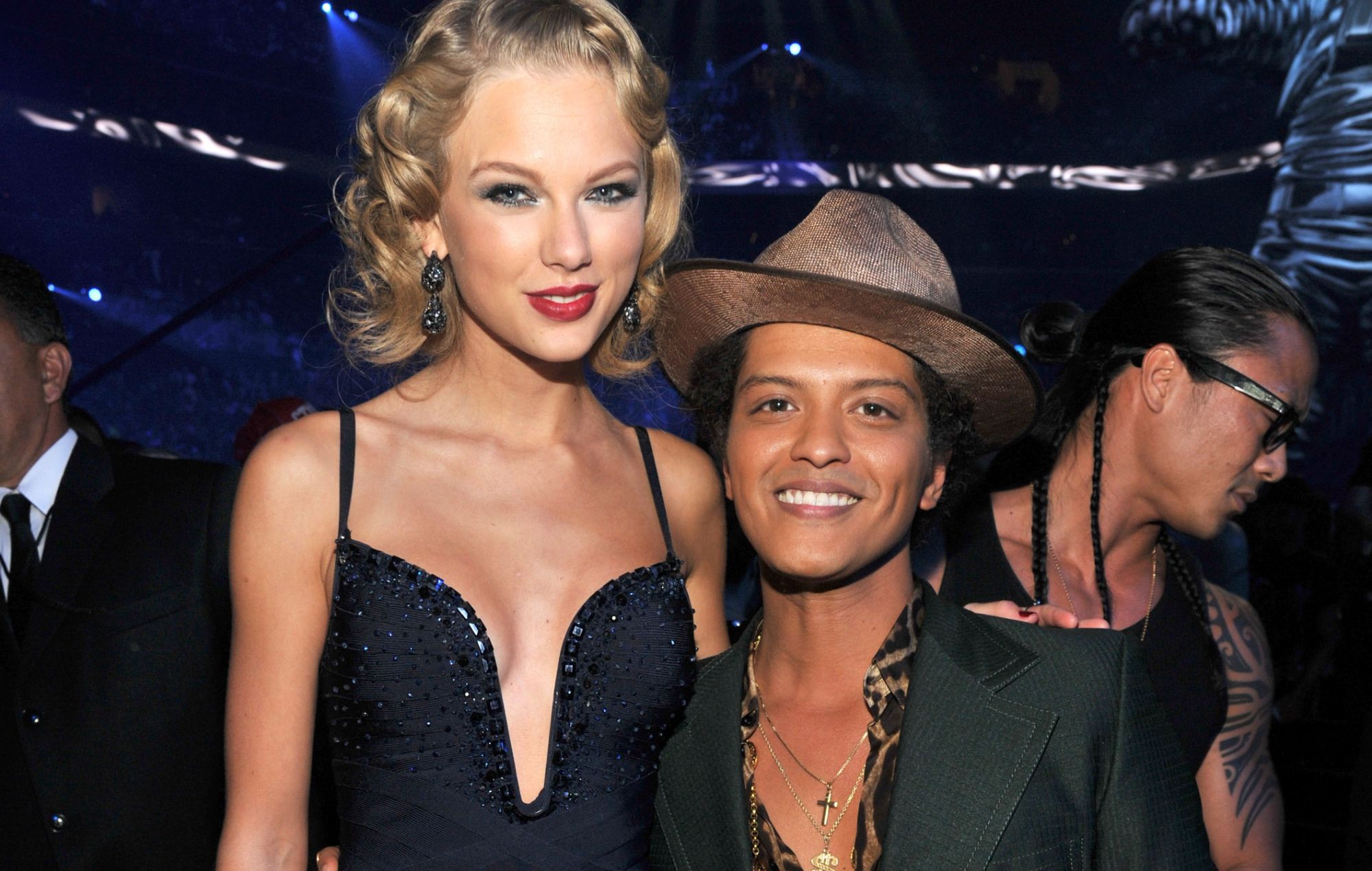 Bruno Mars responds after Taylor Swift fans accuse him of dissing her in liking post calling her “talentless”