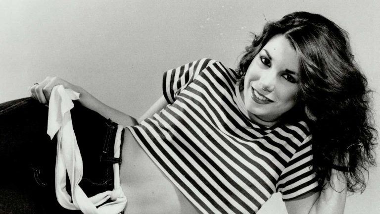 “The album cover and title song video are so sexually potent it almost makes you forget how Canadian the rest of the record is.”  What happened when Lee Aaron declared herself the Metal Queen