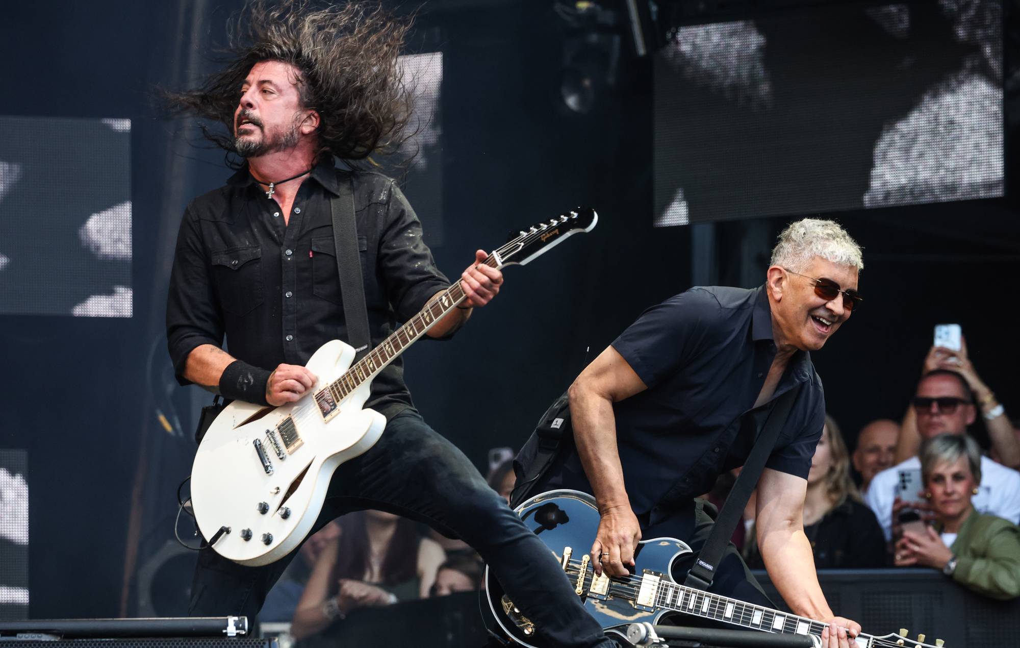 Watch Dave Grohl and Pat Smear surprise fan singing ‘Monkey Wrench’ at Foo Fighters album launch party
