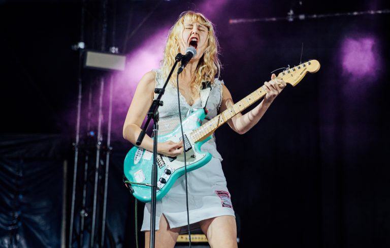 Lambrini Girls reschedule North American tour and pull out of Coachella after Phoebe Lunny reveals neck fracture and “acute brain injury”