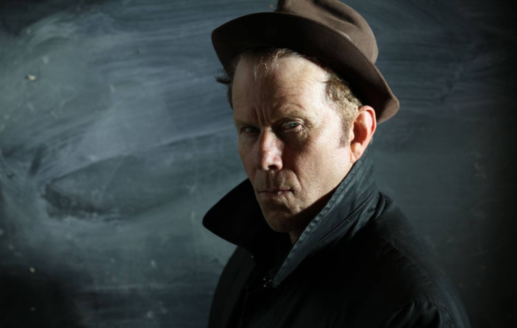 Tom Waits shares a taster of dark spoken word piece ‘The Fly,’, the B-side to ‘Boots On The Ground’: “No one’ll weep when you die”