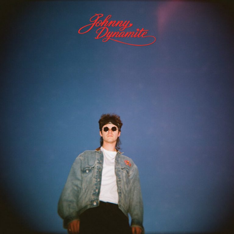 “Losing Humans for an Arms Race” — Johnny Dynamite Shares Video for Melancholic New Wave Track “Sunday Gloomy Sunday”