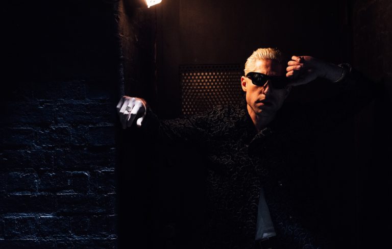 Queens Of The Stone Age’s Michael Shuman shares summer-ready new single ‘LA’ featuring Lily James