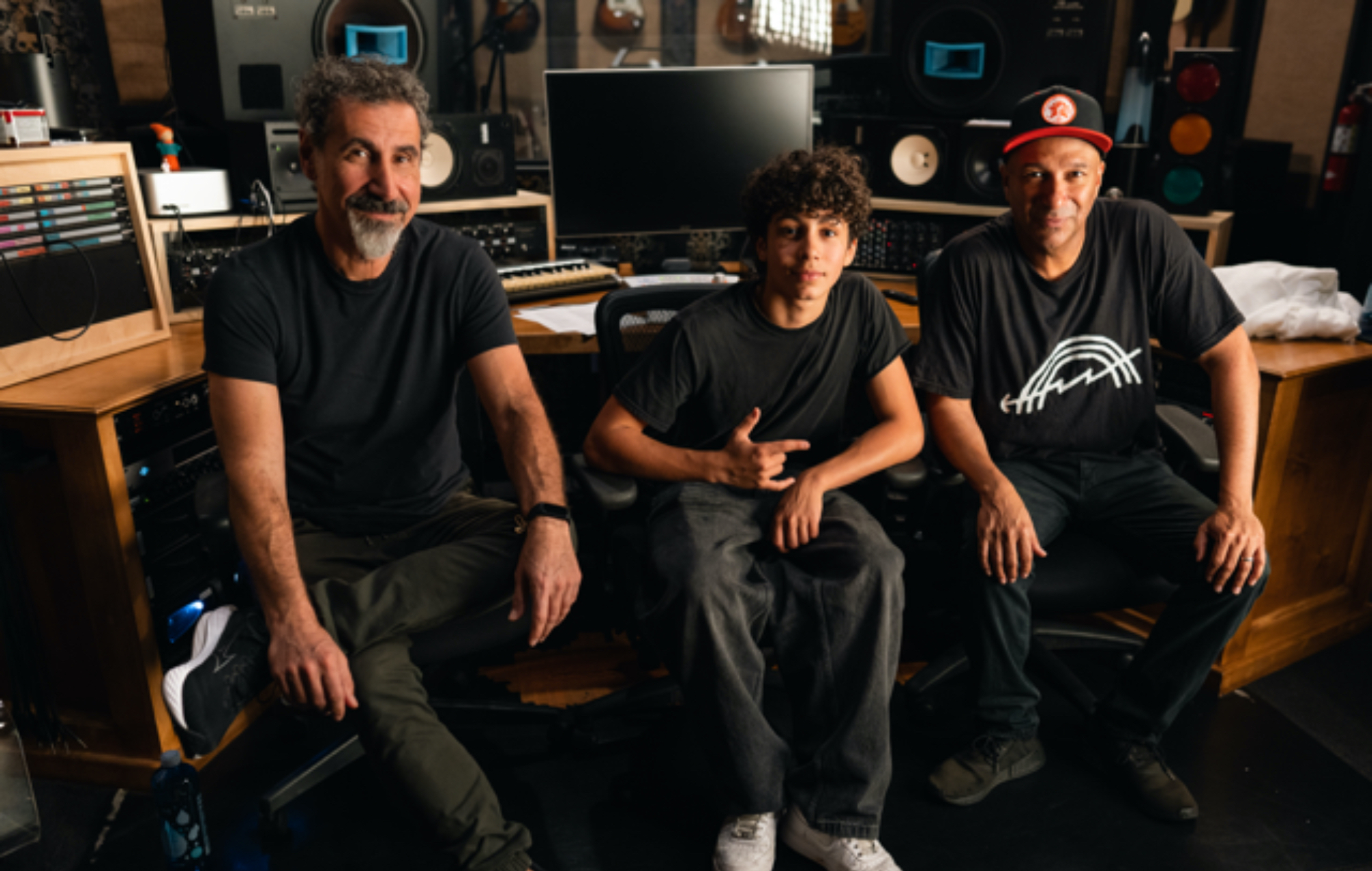 Tom Morello teams up with System Of A Down’s Serj Tankian and son Roman for powerful new single ‘Adjourn It’: “Every act of art is an act of resistance”