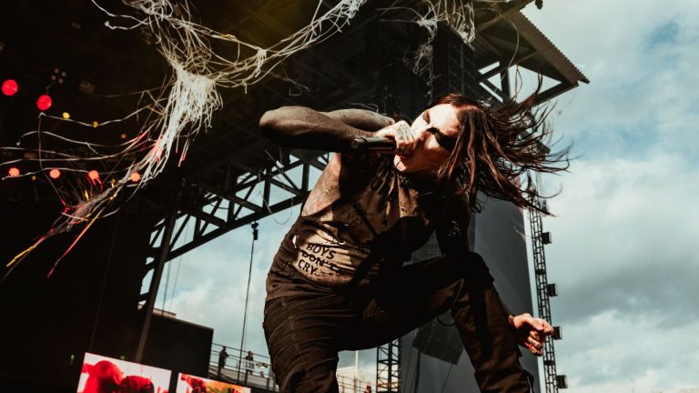 “We spot a man in a cowboy hat twirling another on his shoulders like he’s trying out for WWE.” Goth metalcore heavyweights Motionless In White smash their headline audition in front of one of Sonic Temple’s rowdiest crowds