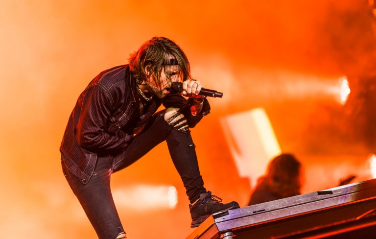 Beartooth’s Caleb Shomo comes out as a “proudly gay man” after becoming target of homophobic abuse on social media