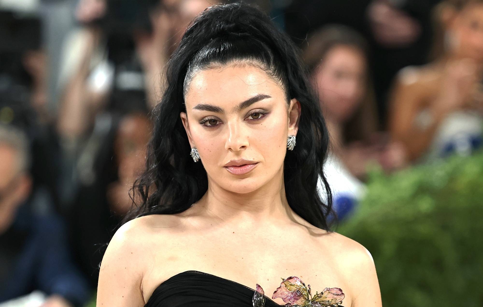 Watch Charli XCX’s raunchy video for cheeky new single ‘Wink Wink’