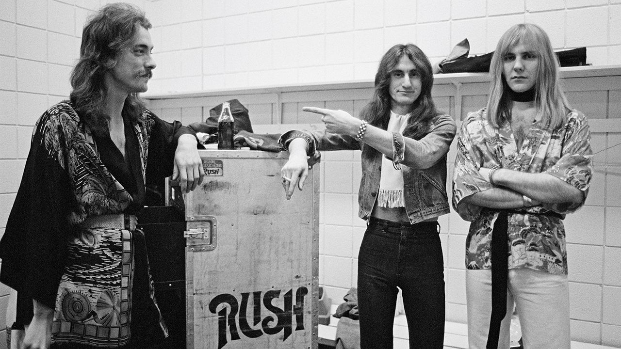 “He was like an alien. He could talk about anything. That’s when we said, ‘Let’s make him do lyrics!’”: Rush’s Neil Peart, an exploding golf ball and two career-changing conversations