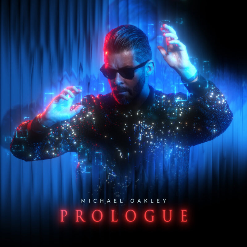 Synthwave Maestro Michael Oakley Surveys a Broken System in Neon-Noir Video for “World of Promises”