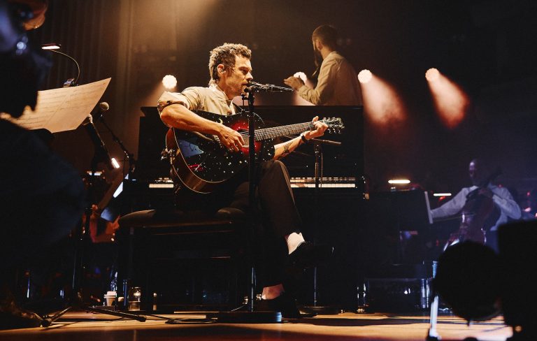 Harry Styles brings orchestral reworkings, rarities and covers to intimate Meltdown Festival show as he hails current moment as his “career highlight”