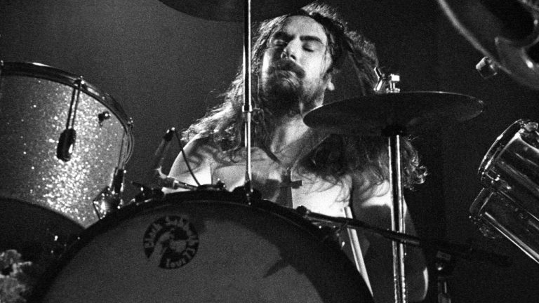 “I’m just catching a ride, I’m not in retirement or ill or giving up”: Black Sabbath’s Bill Ward declares he’s “still a drummer” despite needing to use a wheelchair