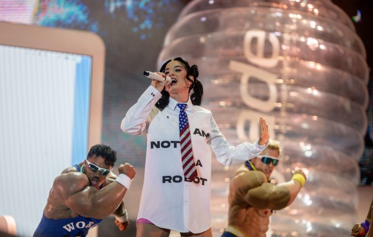 Watch Katy Perry get stuck inside giant bottle as crowdsurf stunt goes wrong