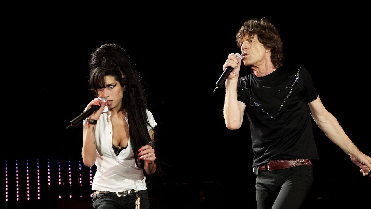 “I said, ‘Look, everyone knows you’ve got vodka in the water bottle. Get it together and get on stage’.” The Rolling Stones share their memories of the late Amy Winehouse